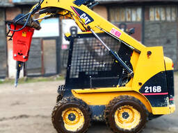 Аренда Мини-погрузчик Caterpillar 216B3 с гидромолотом