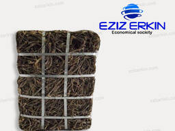 Корни и корневища солодки, резанные мелкими кусочками.