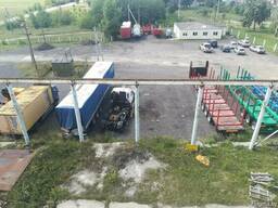 Открытая бетонированная площадка с кран балками в аренду