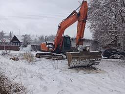 Услуги гусеничного экскаватора
