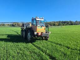 Услуги по внесению удобрений и химической обработке растений