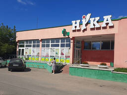 Здание действующего магазина со складскими помещениями